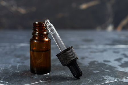 amber bottles with dropper pipettes for cosmetology.の写真素材
