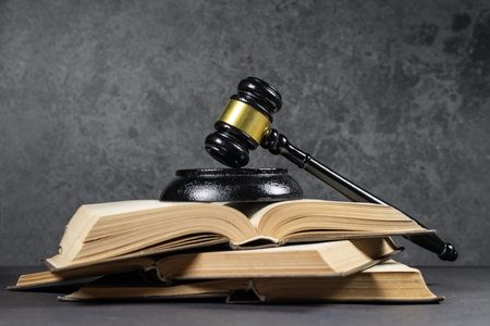 Law theme, lawyer's desk. Judge gavel on legal books.の写真素材