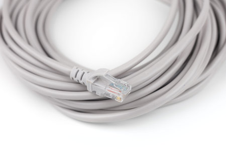 RJ45 Ethernet Network Internet Cable isolated on a white background.