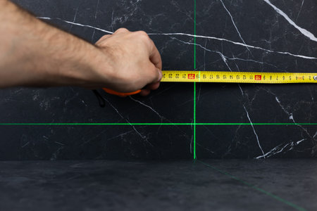 Electronic laser for checking angles and straight lines during measurements.