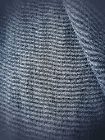 Grunge pattern of closeup old denimjeans texture.の素材