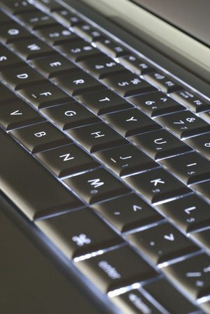 Silver keyboard with backlit keys.
