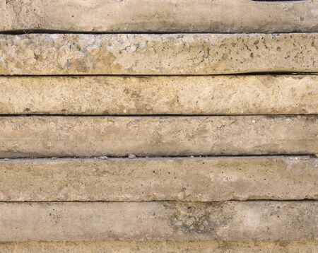 Texture of concrete blocks stacked on top of each other. Concrete blocks lying on top of each other.の写真素材