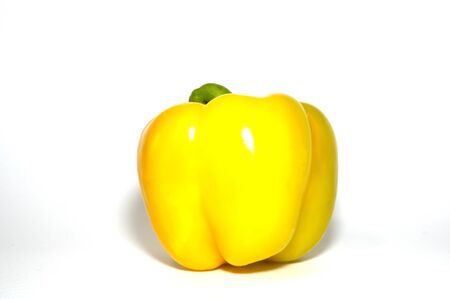 yellow bell pepper paprika on a white backgroundの写真素材
