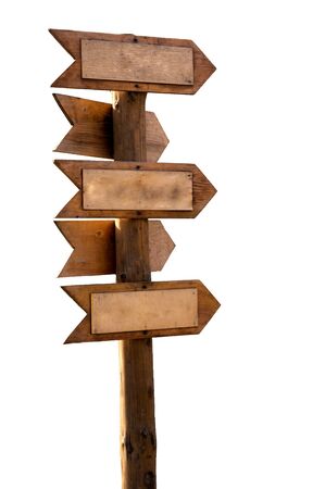 Wooden pole with direction indicatorsの写真素材