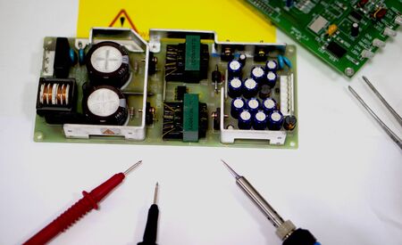 Repair of electronics at the master's workplaceの写真素材