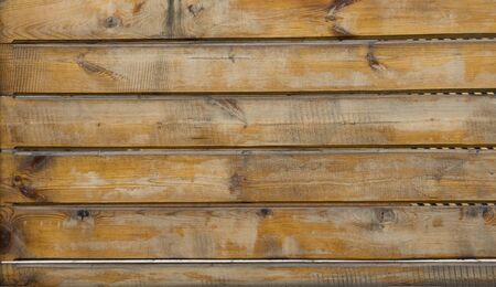 The texture of a wooden wall made of boardsの写真素材
