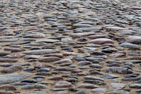 Creative background. Old cobblestone road background