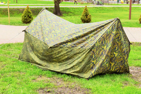 Camping tent on green grass in the park, closeup of photoの写真素材