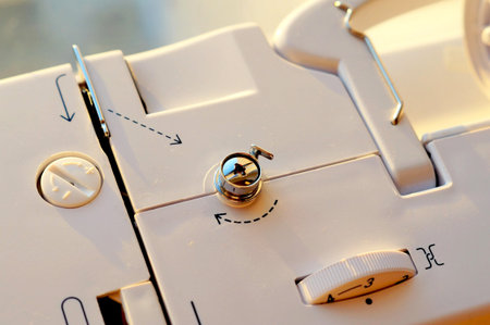 Close up shot of a white computer keyboard with buttons and buttons.