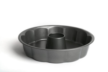 metal mold for baking and food on a white background.