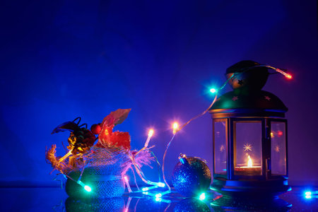 Christmas decorations and garlands on a blue background.