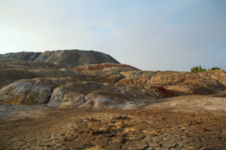 The clay quarry resembles a cosmic landscape.Ural Mars.Top view of the hills made of refractory...