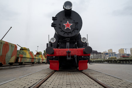 russian black retro train against a gloomy skyの写真素材
