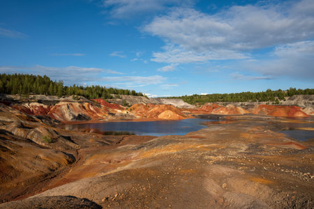 Ural apocalyptic surreal landscape, similar to the surface of the planet Mars. Barren, cracked and scorched earth and soil. The concept of global warming. Clay quarriesの写真素材
