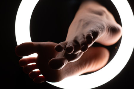 female legs close-up in a round lamp.the concept of hygiene and care.の写真素材