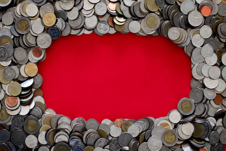Thai baht coin on red background with copy space 