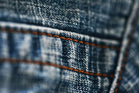 Jeans denim texture close up , focus only one point , soft blured background wallpaperの写真素材