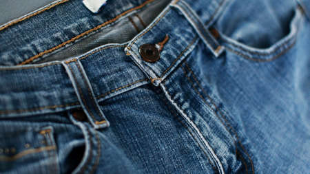Jeans denim texture close up , focus only one point , soft blured background wallpaperの写真素材