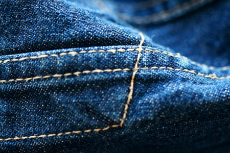 Jeans denim texture close up , focus only one point , soft blured background wallpaperの写真素材