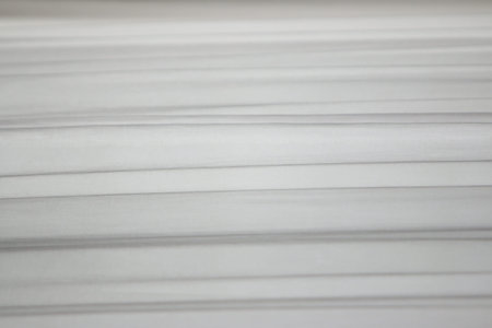 Close up of a pile of white paper sheets. Shallow DOF.