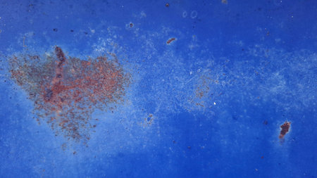Rusty blue metal texture background with space for text or image.