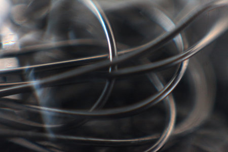 abstract background of metal wire in the dark, close-up