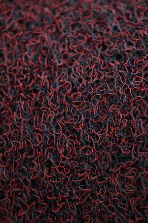 Macro texture of red and black threads for use as a backgroundの写真素材