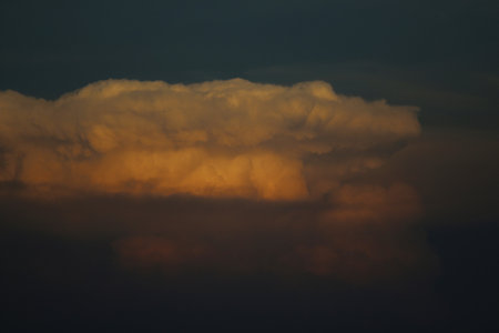 Cloudscape, Colored Clouds at Sunset near the Ocean on a Cloudy Dayの写真素材