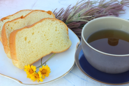 Hot tea with bread line の写真素材