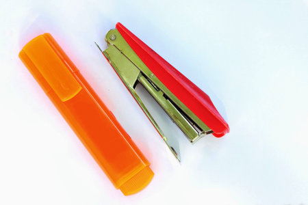 The stapler. With pen highlights.