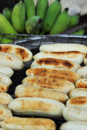 Banana grilled on the stove on the market.の写真素材