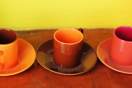 Set of bright colorful mugs の写真素材