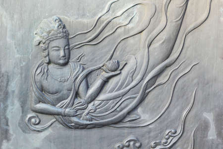 Surface of Style Bronze wall of the temple in Korea. の写真素材