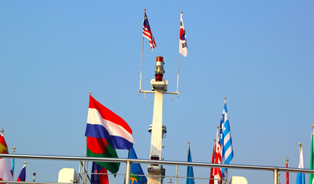 There are many flag ferry to Nami Island, Korea.の写真素材