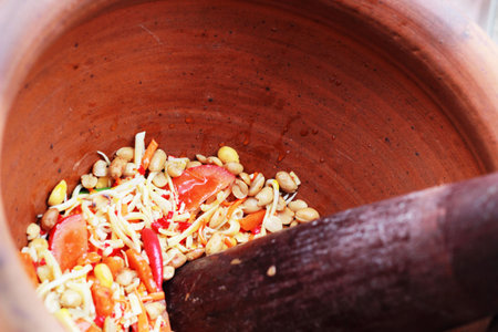 Papayd salad on stone mortar