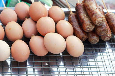 Grilled chicken eggs on the stove.の写真素材