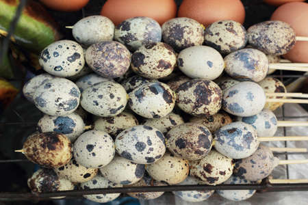 quail eggs on the grill.の写真素材