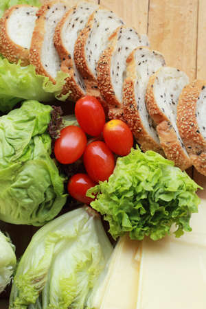 bread sprinkled with sesame -  vegetable green saladの写真素材