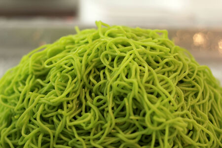 Green egg noodles background textureの写真素材