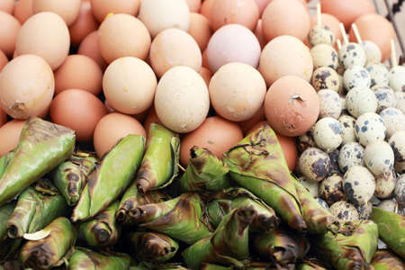 chicken and quail eggs on the grill.の写真素材