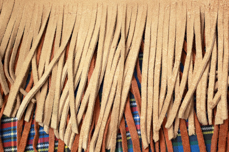 brown coat made from animal skins.の写真素材