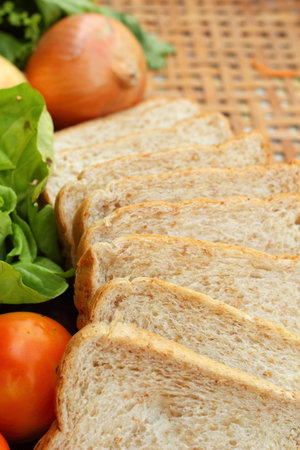 Fresh vegetables salad with whole wheat bread.