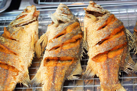 Fried fish in the plateの写真素材