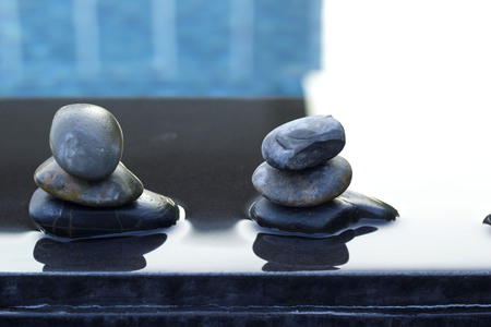 Spa stones beside the pool.の写真素材