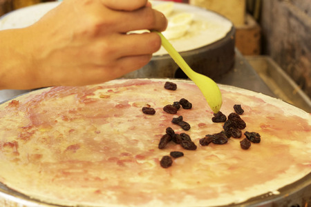 Making  crepe banana chocolate crispy pancakeの写真素材