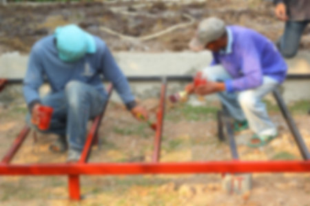 Construction workers are painted steel