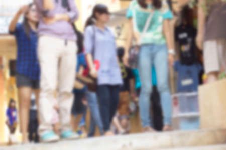 Blurred of people walking in parkの写真素材