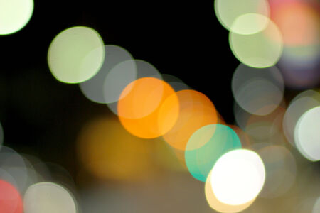 Blurred of car in city at nightの写真素材