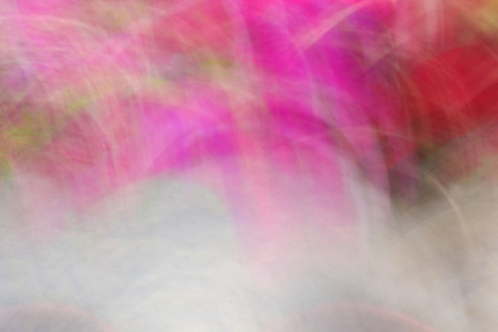 blurred light trails is background beautyの写真素材